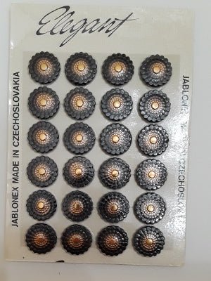 Vintage Czechoslovakian glass button card with 24 black and gold buttons featuring raised disc pattern and gold centers, Elegant brand, 28mm