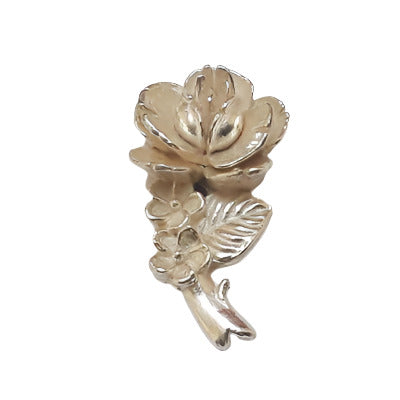 Silver metalized plastic flat back, right-facing long stemmed rose, 12×25mm, vintage Japanese 1950s.