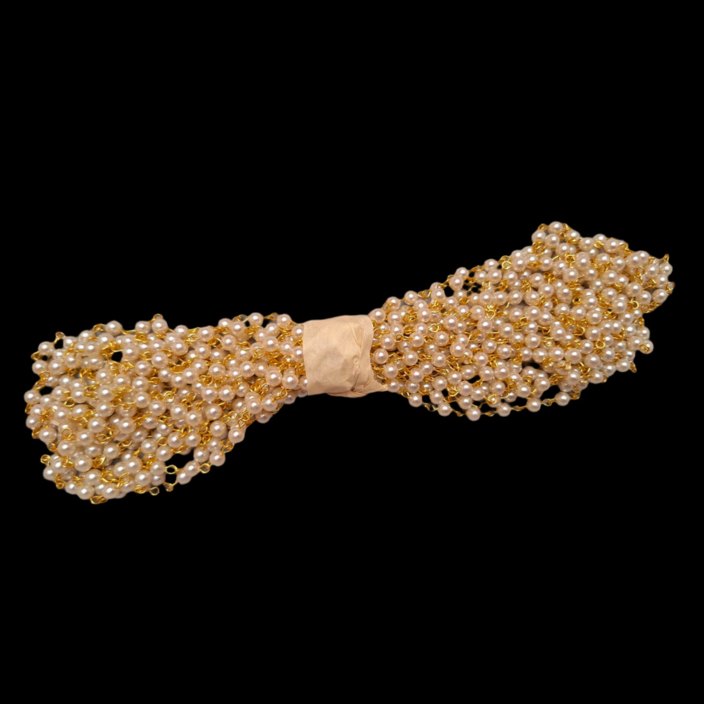 Bunch of 5mm chain pearl with gold-colored links wrapped in the center with paper tape.