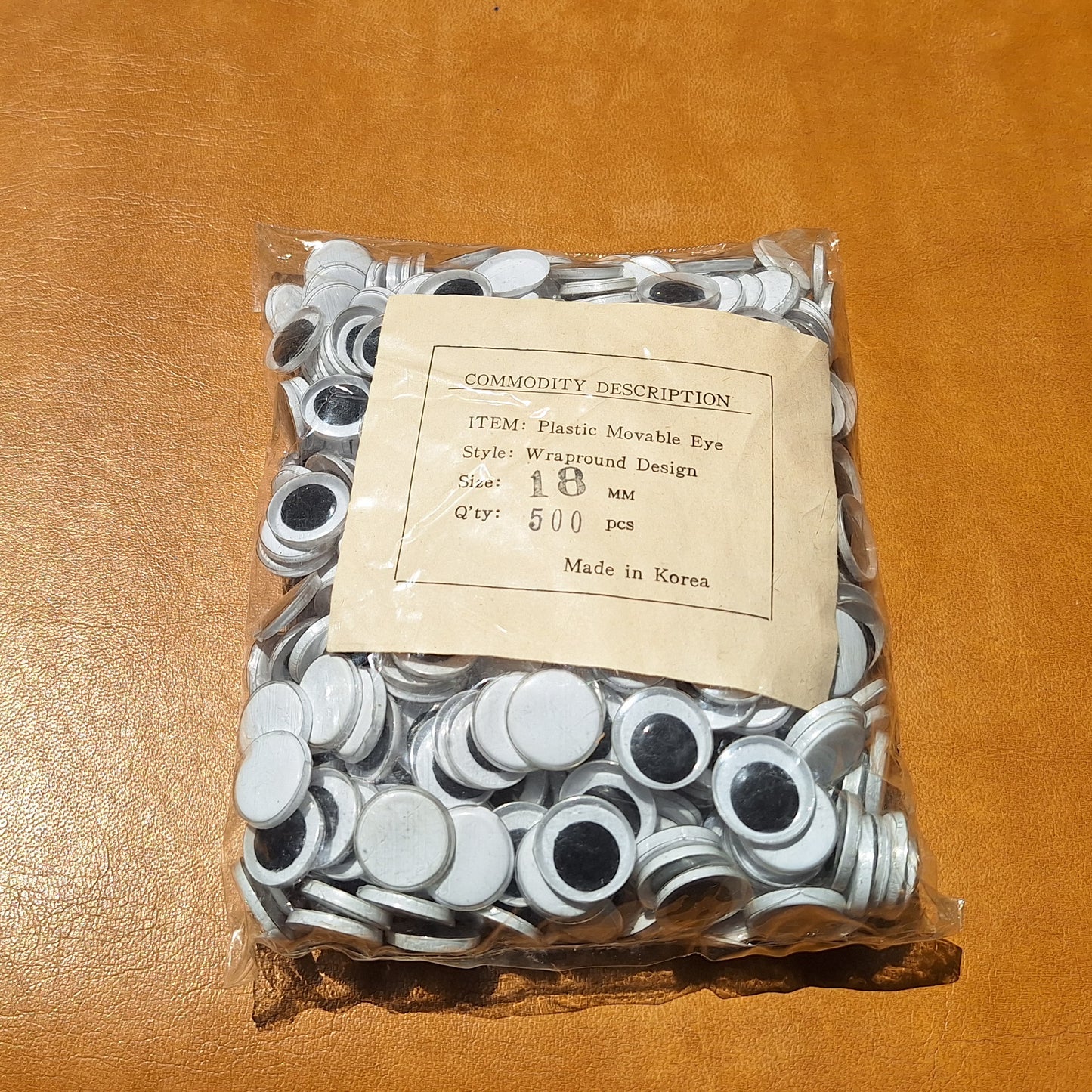 Bag of 500 18mm plastic moveable flat back eyes from Korea.