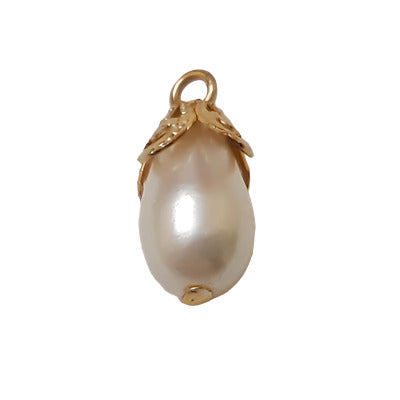 Pearlized 7×12 mm plastic drop with gold filigree cap and pin-shank attachment shown in angled view.