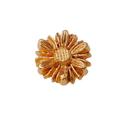 Open daisy plastic flat back in metalized gold color. 12mm