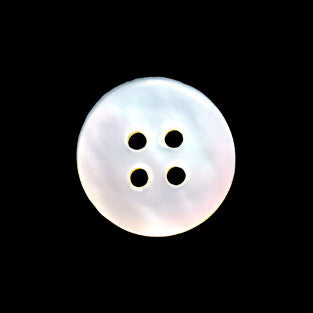 Back view of a mother-of-pearl shell button showing natural shell coloration and the four-hole structure on a dark background.