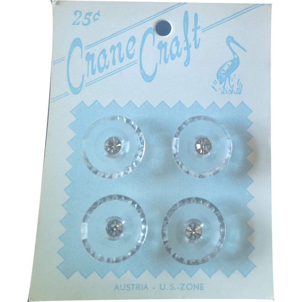 Four faceted crystal self-shank buttons with rhinestones in the center. Reads made in Austria.U.S. Zone.