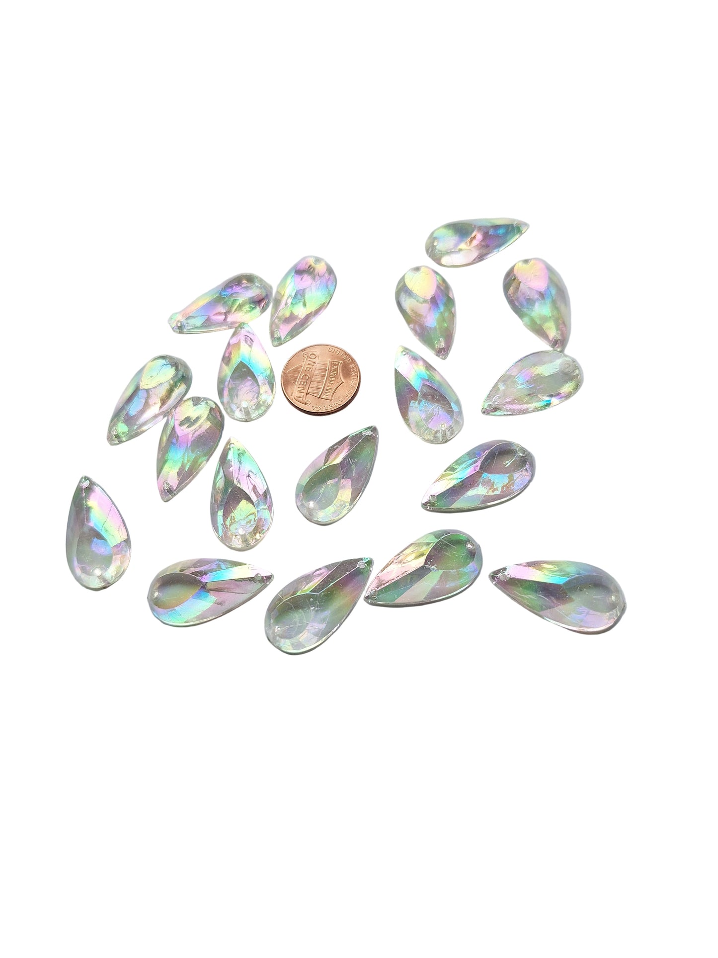 Group photo of vintage crystal AB acrylic teardrop cabochon, table-cut with two-hole sew-on flat back, 14×27 mm. Penny is shown for scale