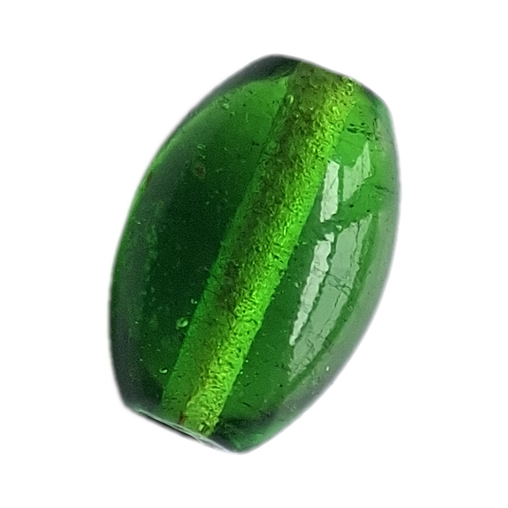 Emerald green smooth Peking-style oval glass bead with translucent body, internal stringing channel, and small bubble inclusions.