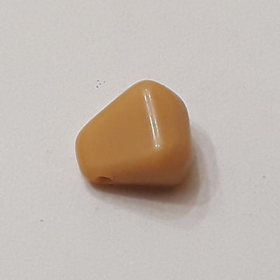 Tan glass kernel drop with smooth rounded shape and side-drilled hole, 8×10 mm.