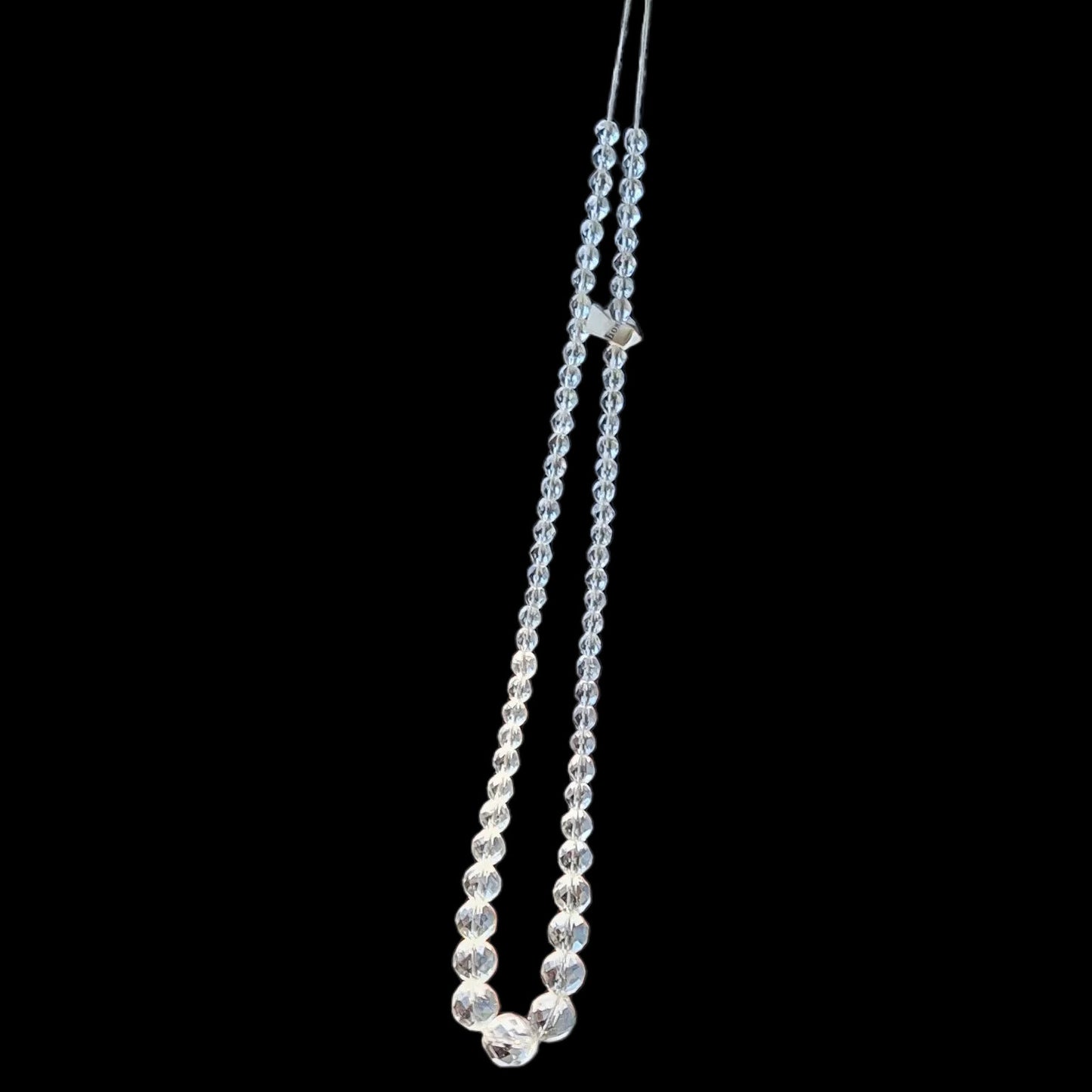 Clear crystal glass necklace strand with graduated faceted beads, no clasp, showing full length and bead progression