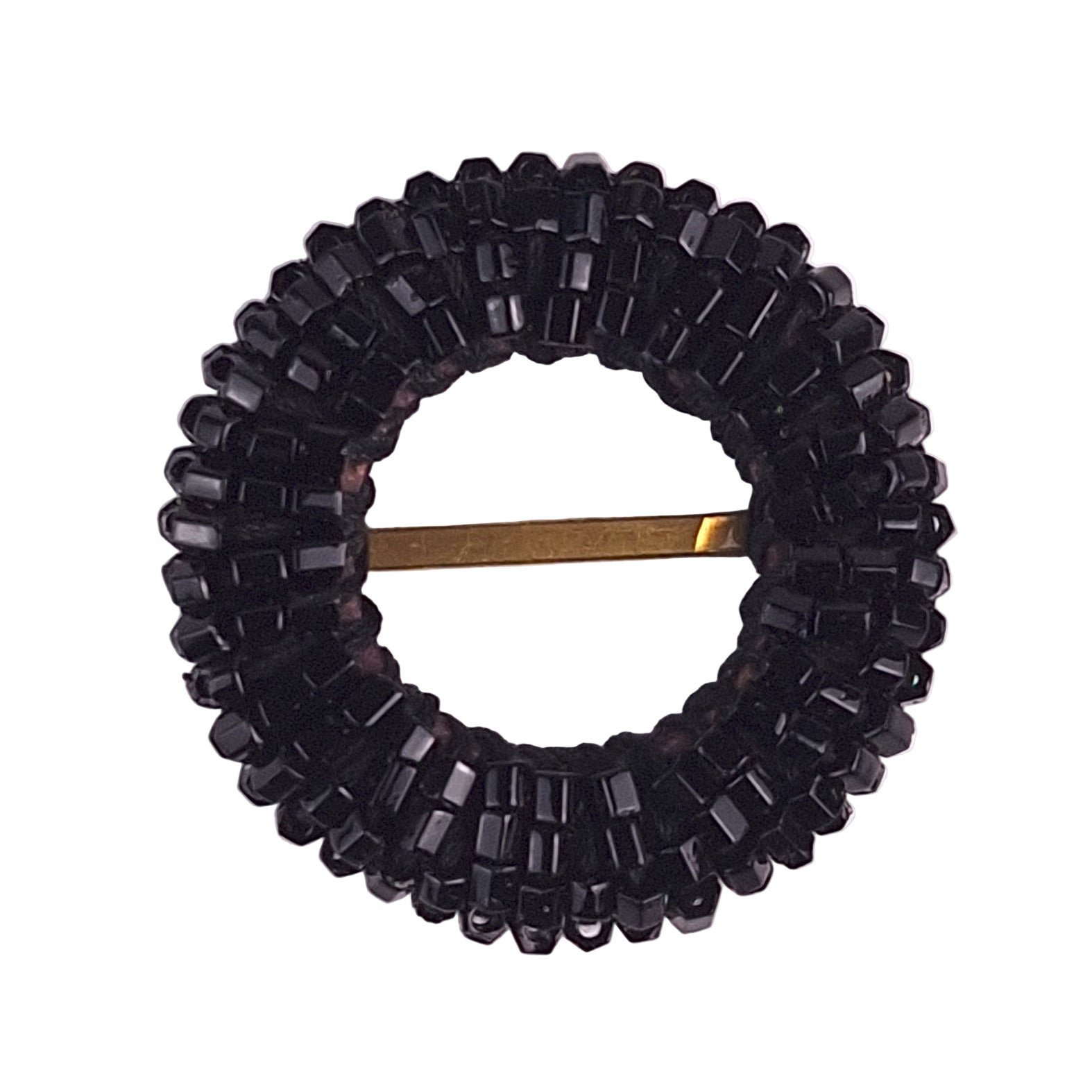 Black buckle: Round jet black beaded buckle with densely sewn seed beads and a central brass bar.