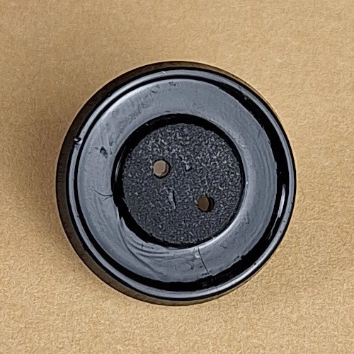 Back: Black glass button, two-hole back, 18mm