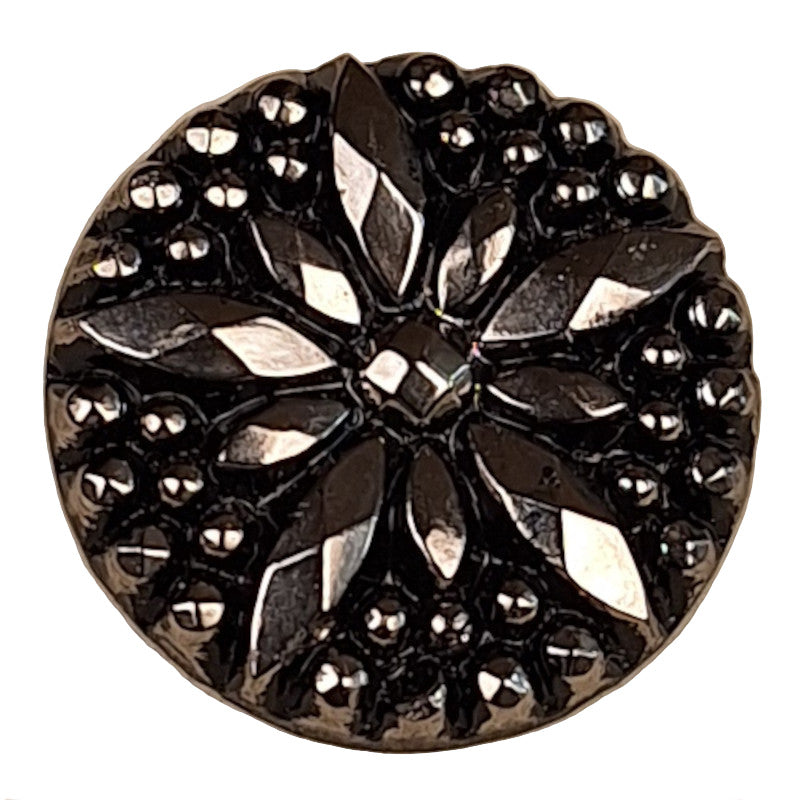 black and silver glass button with an engraved  large faceted star