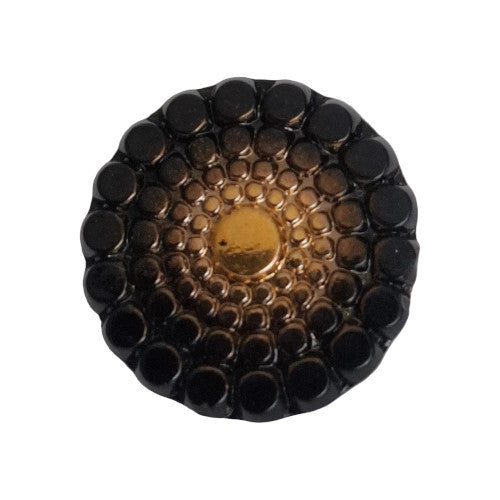 Black glass button with raised disc pattern and gold center, self shank, 28mm