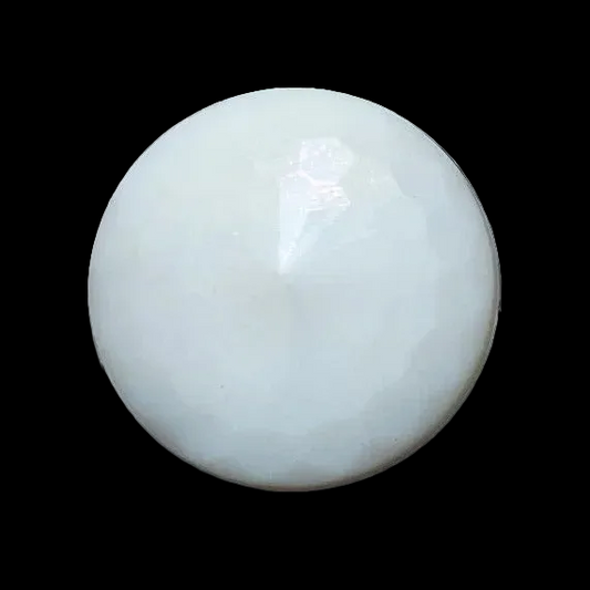 Close-up photo of a round white faceted glass button in the medium 18mm size with soft reflections highlighting the facets.