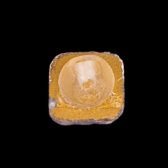 Reverse side of square mirrored glass button showing mirrored back and shank attachment, 11.4mm