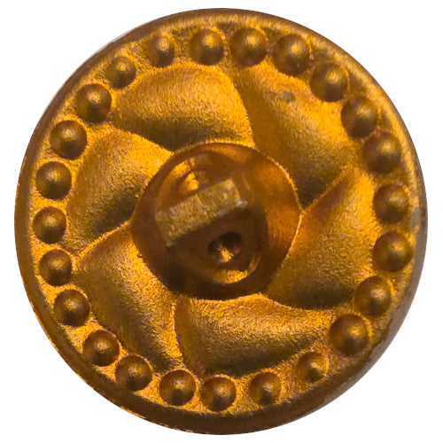 Back of mirrored glass button with swirl design