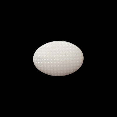 White glass shank button, oval shape with fine hatched surface texture, shown centered against a black background. 11.4mm/18L