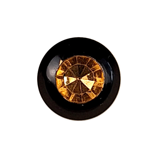 Jet and gold glass button with faceted central cavity