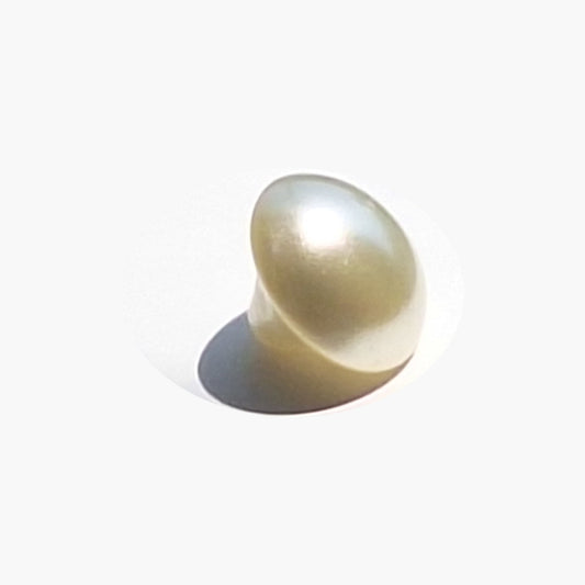 Pearl pearlized half ball button with self shank in 10mm size shown with smooth curved surface.
