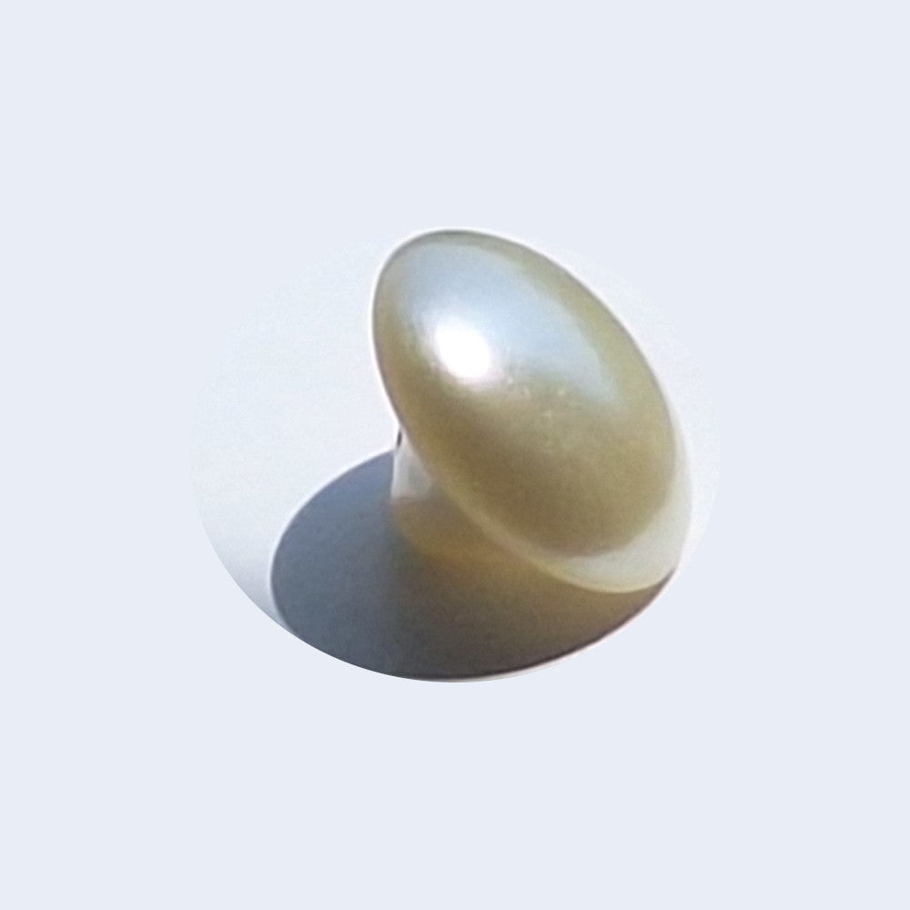 Pearl pearlized half ball button with self shank shown in angled light to highlight the curved reflective dome, 16mm.