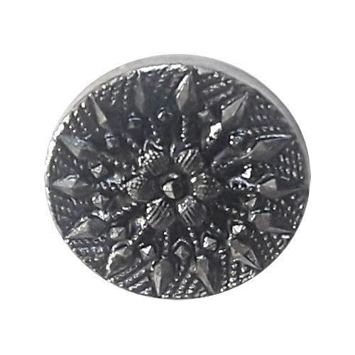 Gunmetal metalized button with raised starburst design and geometric detailing radiating from a central flower, shank back, 18mm.