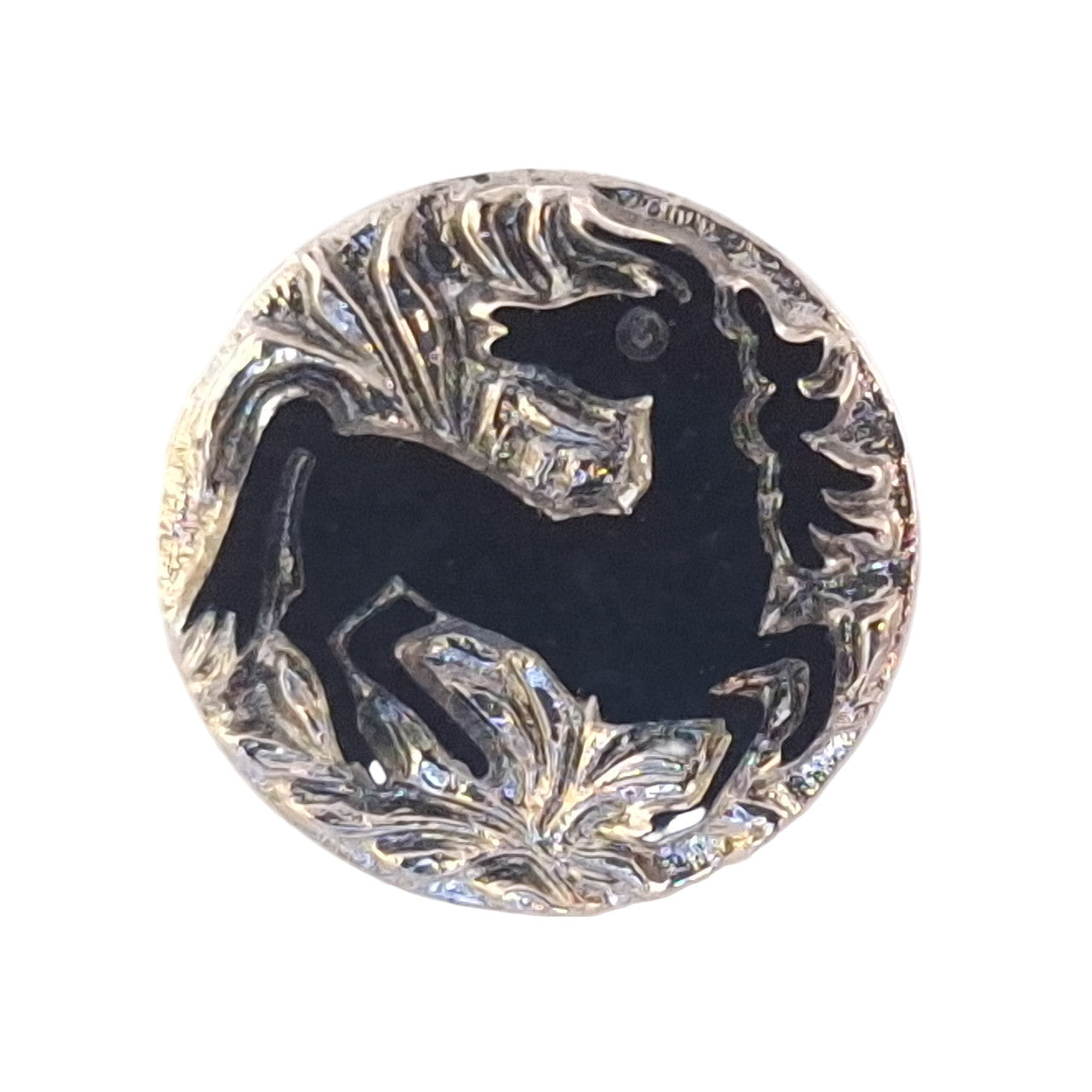 Black glass button with a rearing horse silhouette, framed by a raised clear molded border and decorative scrollwork, 18mm/28L.