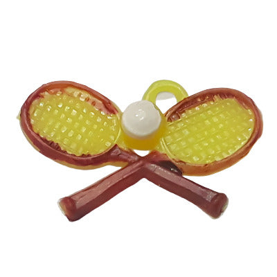 Hand-painted plastic flat back of a pair of brown and yellow tennis rackets with a white ball.