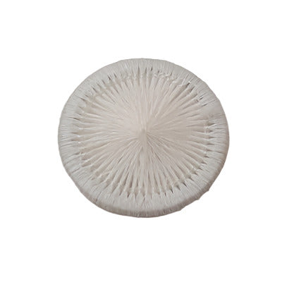 White rayon Dorset button with a thread-wrapped ring and radial woven center, shown flat to display its 13mm size and texture.