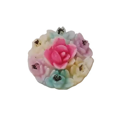 plastic flat back of a round 15mm pastel colored bouquet on a white background