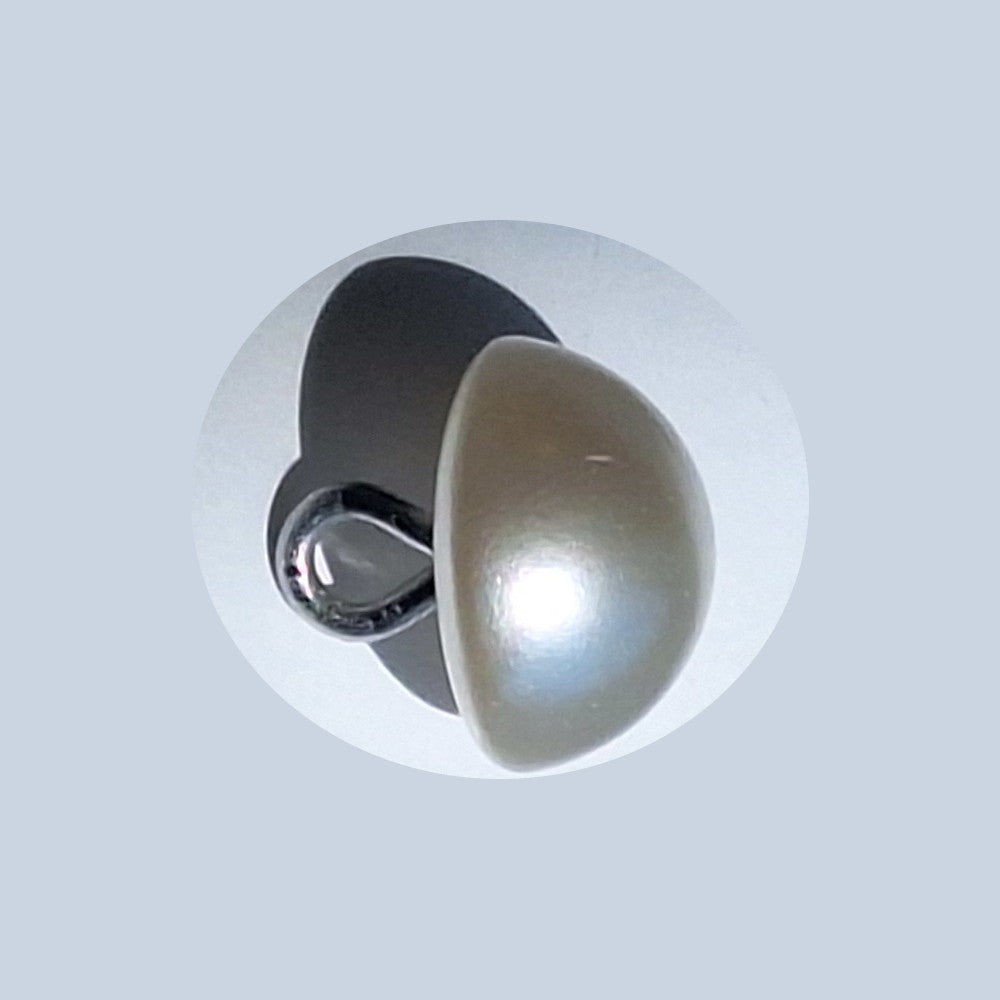 Pearlized half ball button with screw shank, angled to show smooth reflective surface, 10mm.