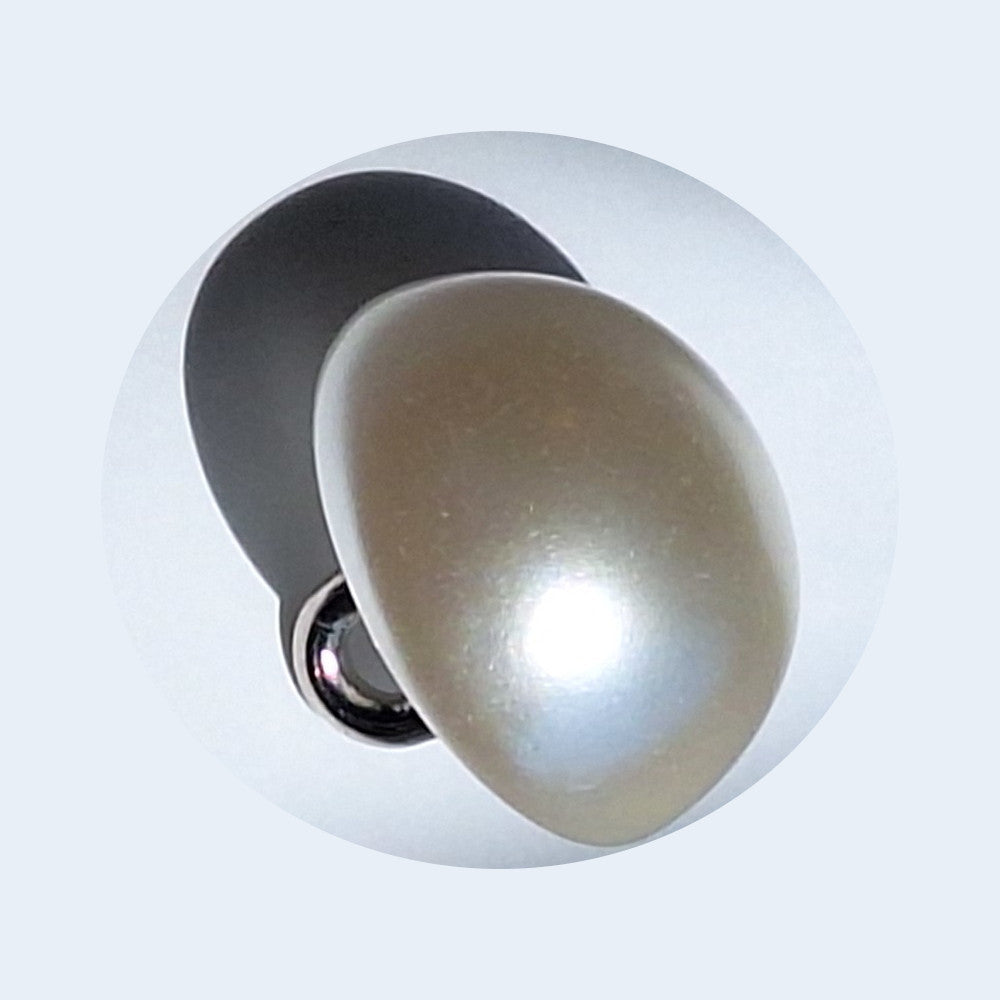 Pearlized half ball button with screw shank, angled to show smooth reflective surface, 14mm.