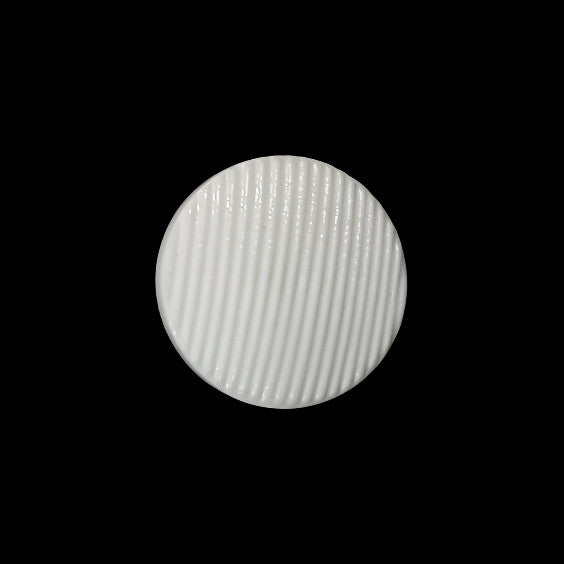 Small white ribbed glass shank button shown from the front with fine diagonal ribbing.