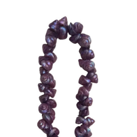 Purple strung seashells with hand-punched holes and natural 1/4-inch shells shown on strand segment.