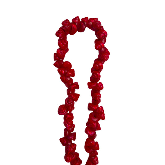 Red strung seashells with hand-punched holes and natural 1/4-inch shells shown on strand segment.