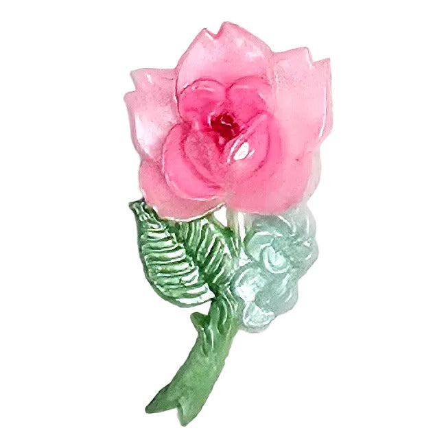 Large vintage hand-painted plastic floral flatback featuring a pink rose with green and pale aqua leaves. Stem facing left. 19x36mm