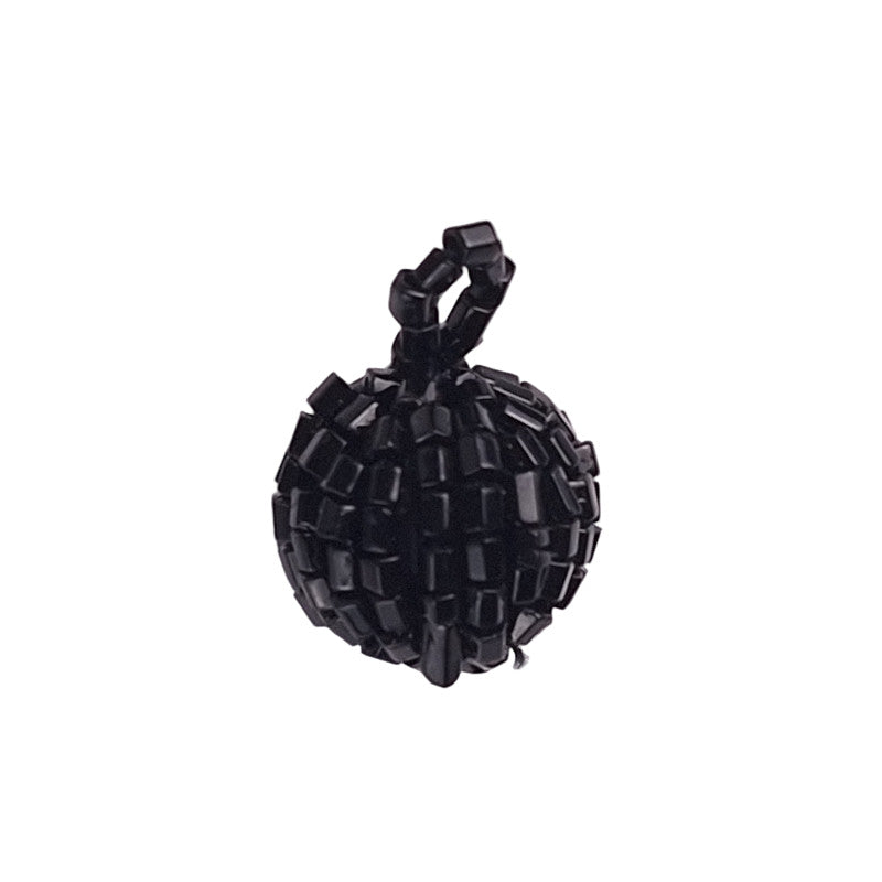Jet black glass-beaded ball with loop attachment shown in close-up with glossy finish.