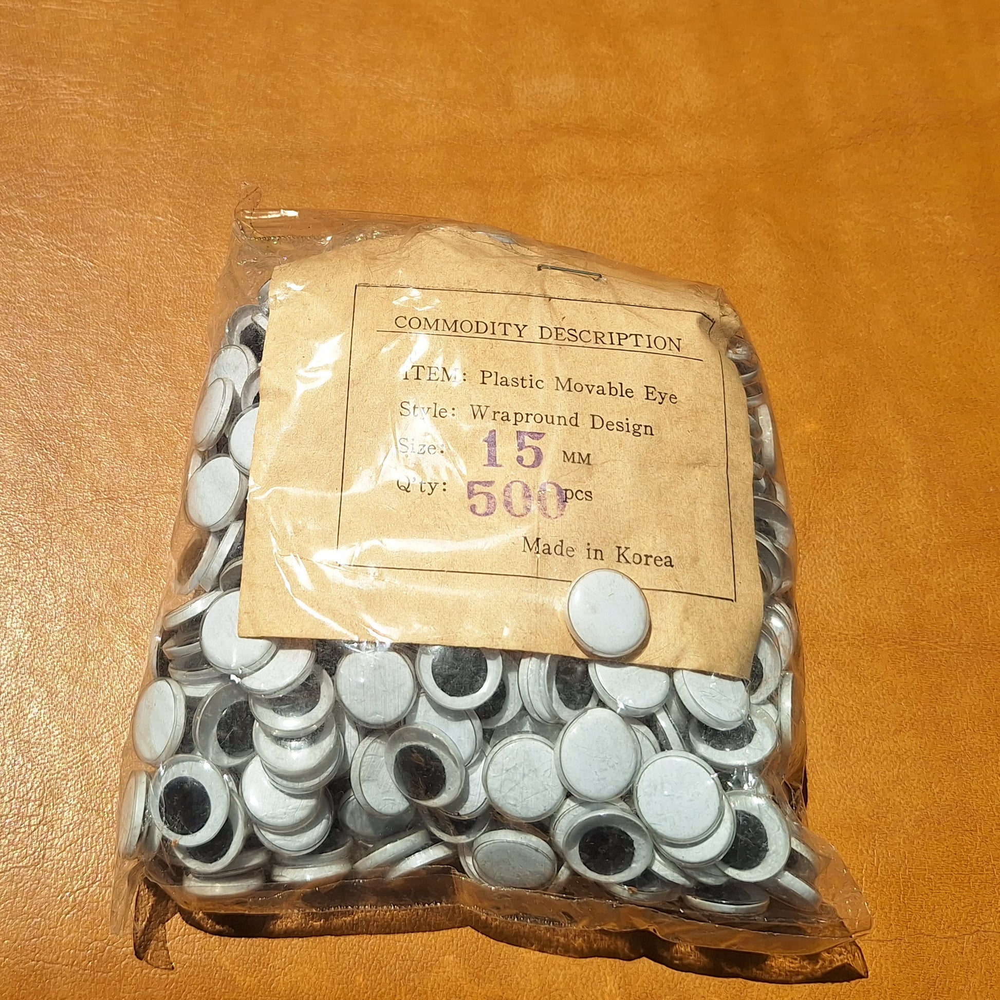 Bag of 500 15mm plastic moveable flat back eyes from Korea.