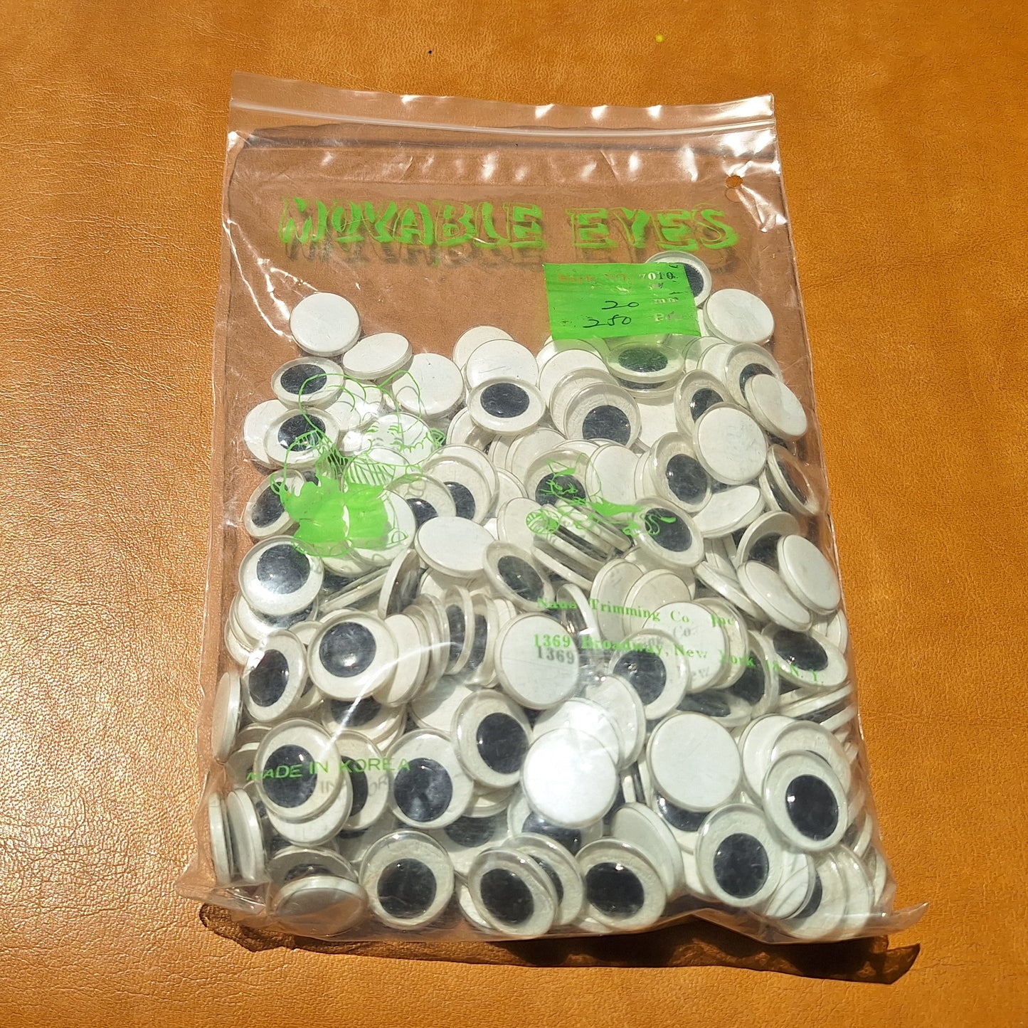 Bag of 250 20mm plastic moveable flat back eyes from Korea.
