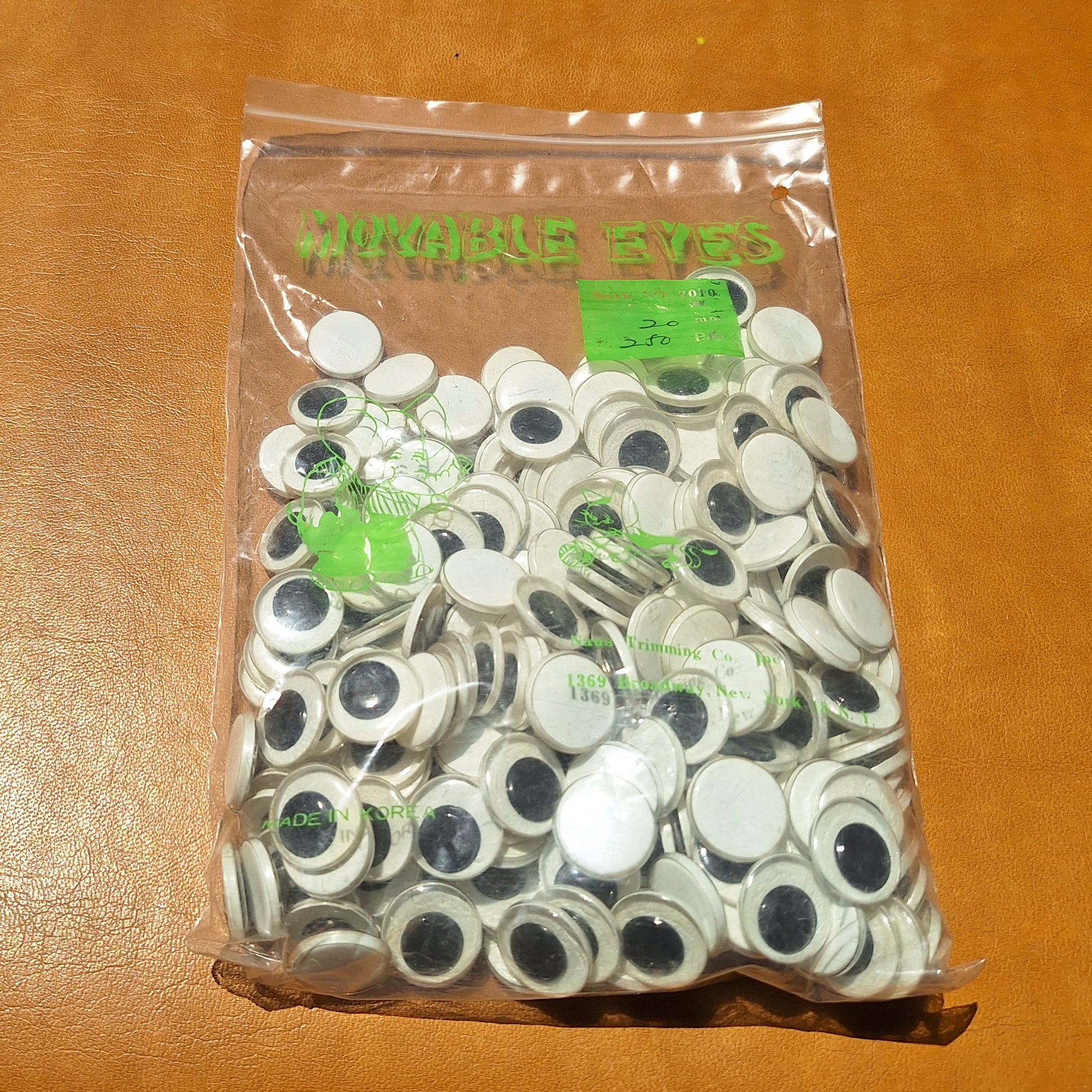 Bag of 250 20mm plastic moveable flat back eyes from Korea.