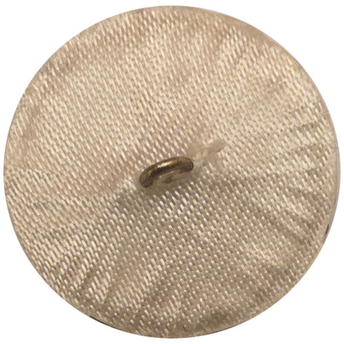 Back of a silver beaded round button with radiating tube beads forming a clustered circular pattern