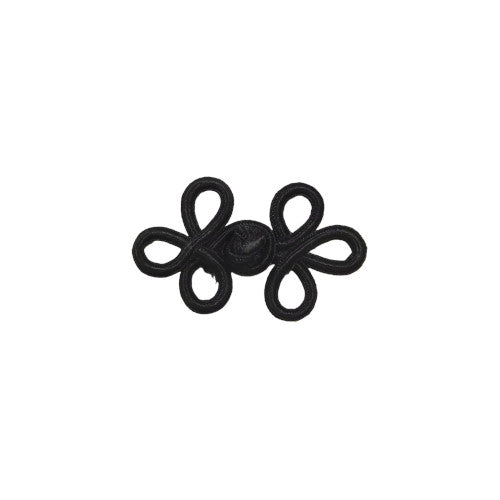 A black soutache frog closure with looped cord construction measuring 57×38mm.