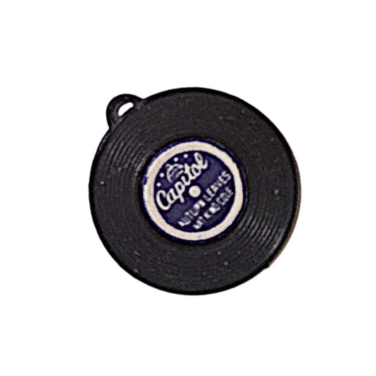 Large 23mm black plastic record-shaped charm with assorted center-colored stickers, vintage Hong Kong NOS.