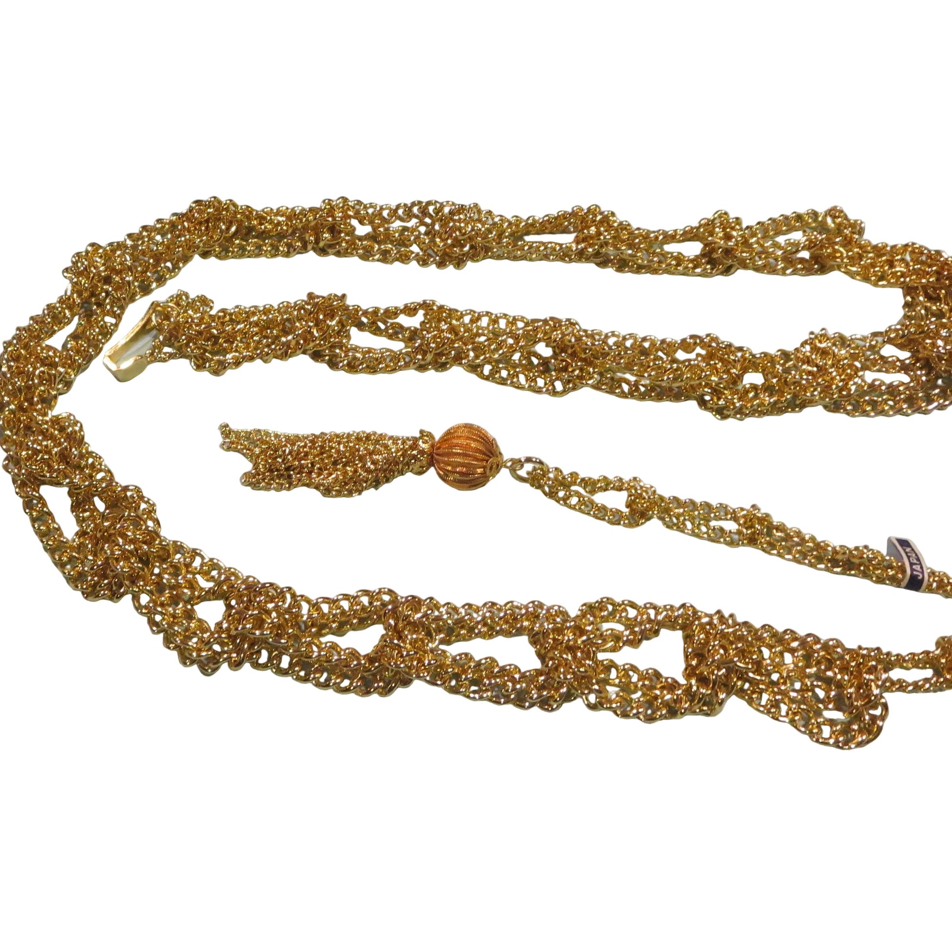 Gold metal chain belt with braided link sections and tassel detail, vintage Japanese 1960s design
