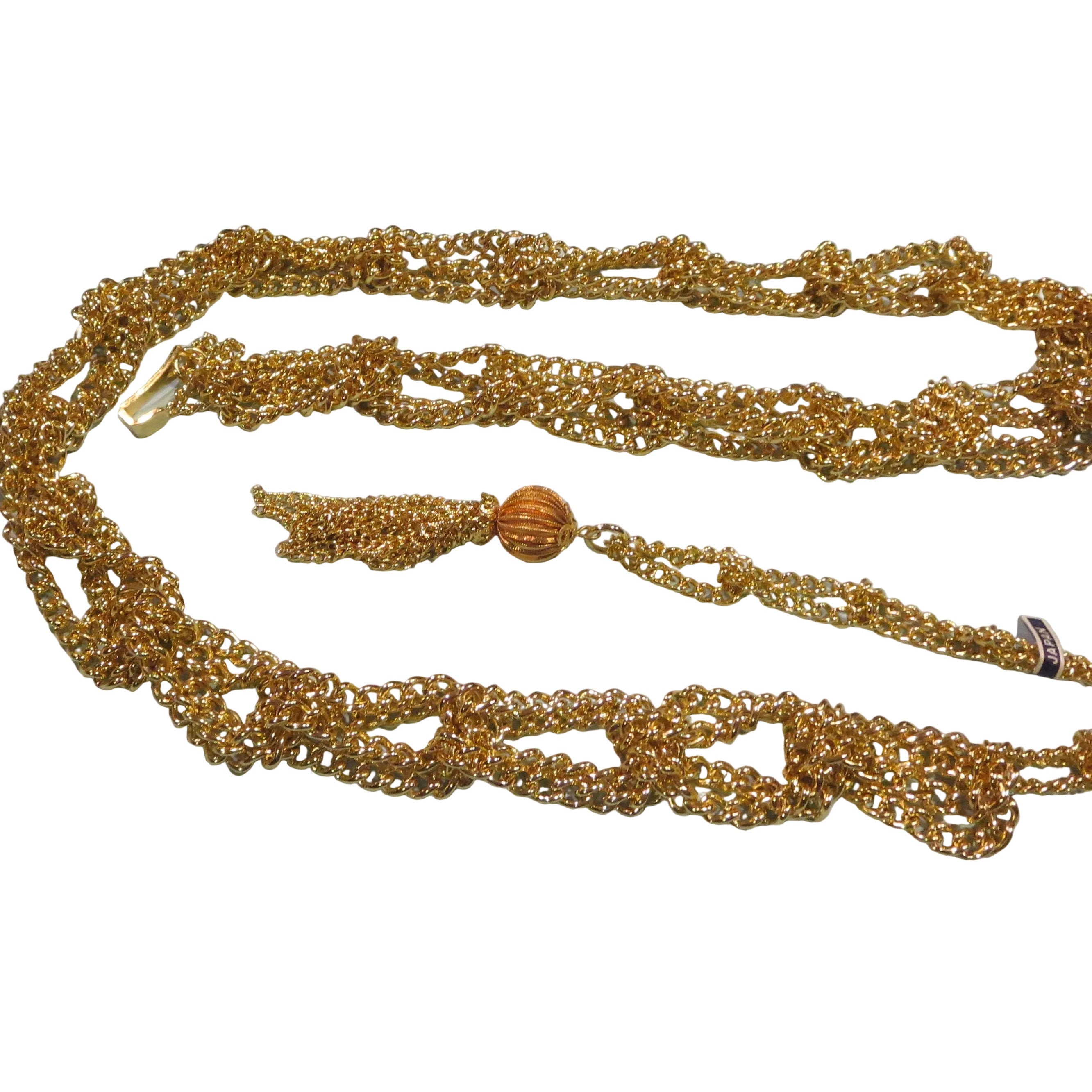 Gold metal chain belt with braided link sections and tassel detail, vintage Japanese 1960s design