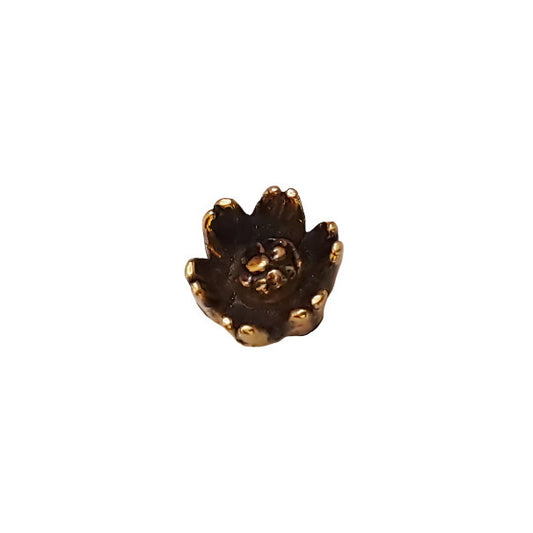 Antique gold metalized plastic flat back, small daisy design, 8mm, vintage Japanese 1950s.