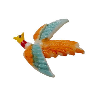 Hand-painted plastic flat back small bird with orange and blue wings, left-facing, 19×20mm.