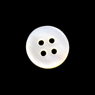 Back view of a mother-of-pearl shell button showing natural shell coloration and the four-hole structure on a dark background.