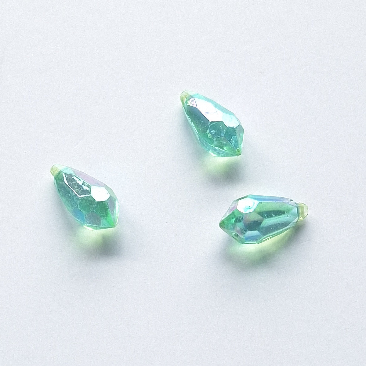 Three AB faceted plastic drop in Aqua, translucent, sew-on, 6.5x13mm.
