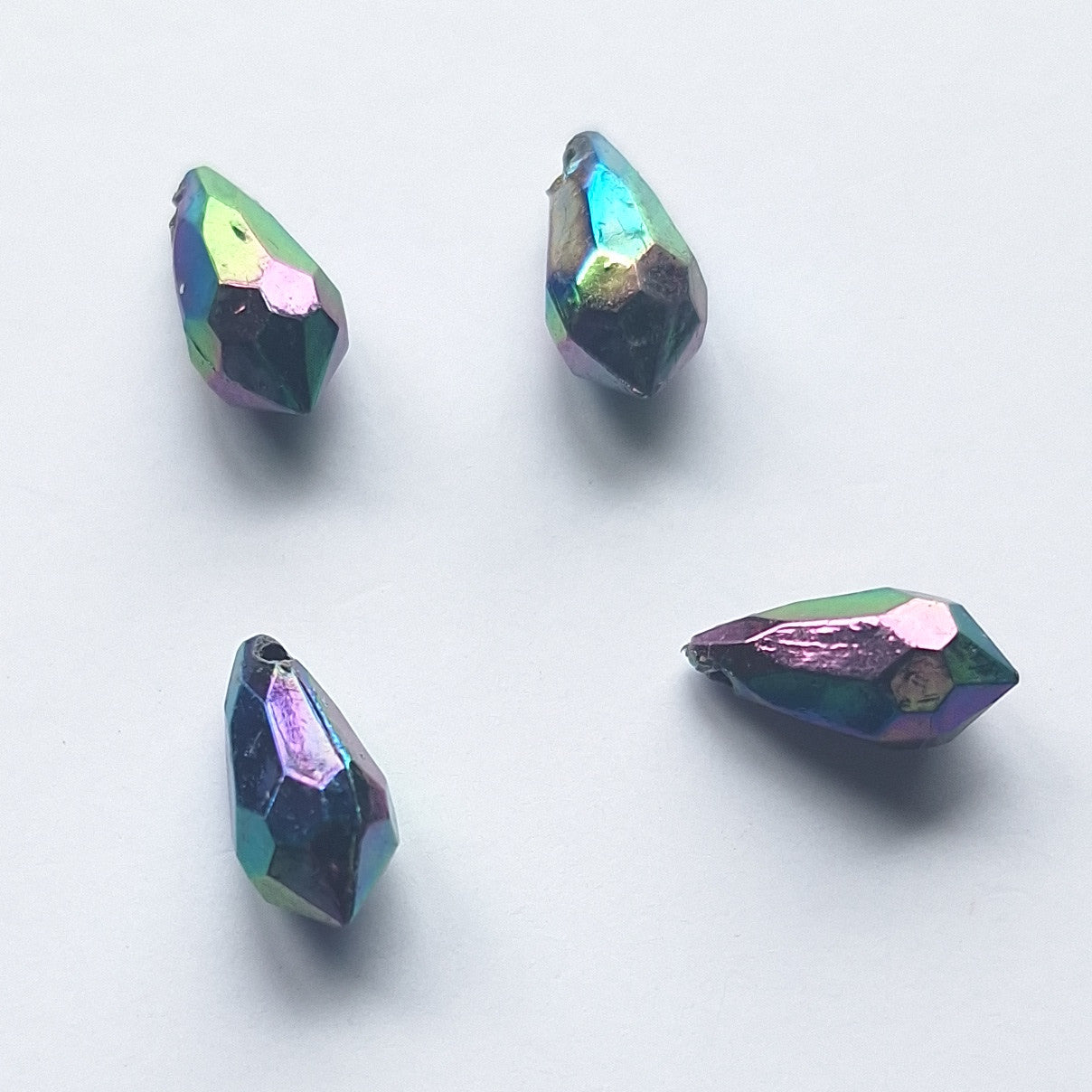 Four AB faceted plastic drop in Metallic, opaque, sew-on, 6.5x13mm.