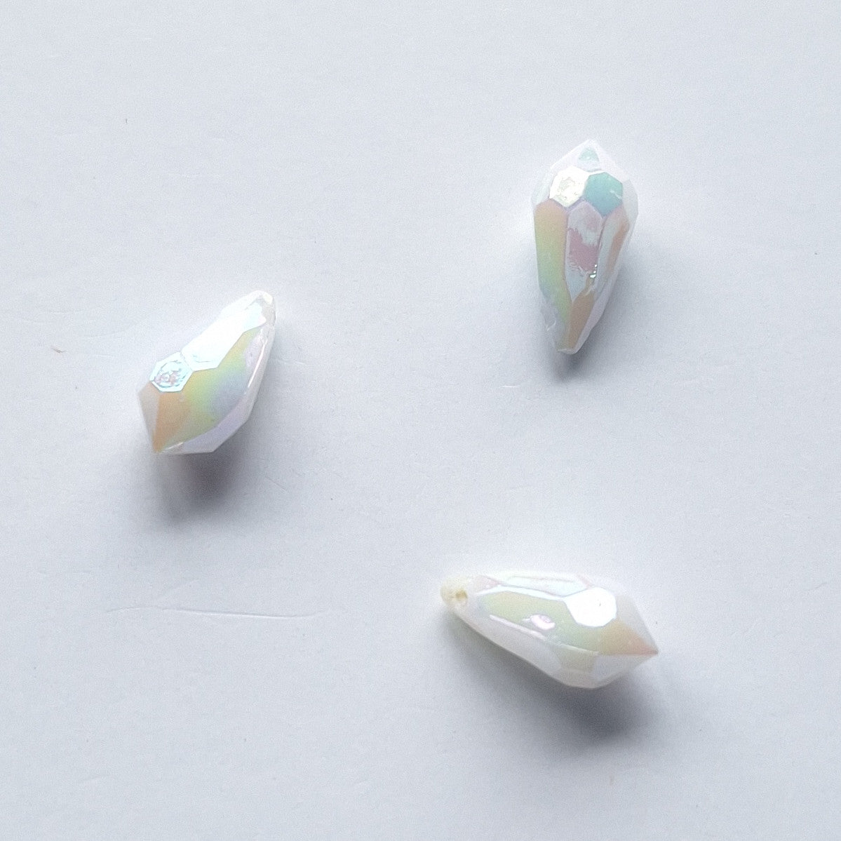 Three AB faceted plastic drop in White, opaque, sew-on, 6.5x13mm.