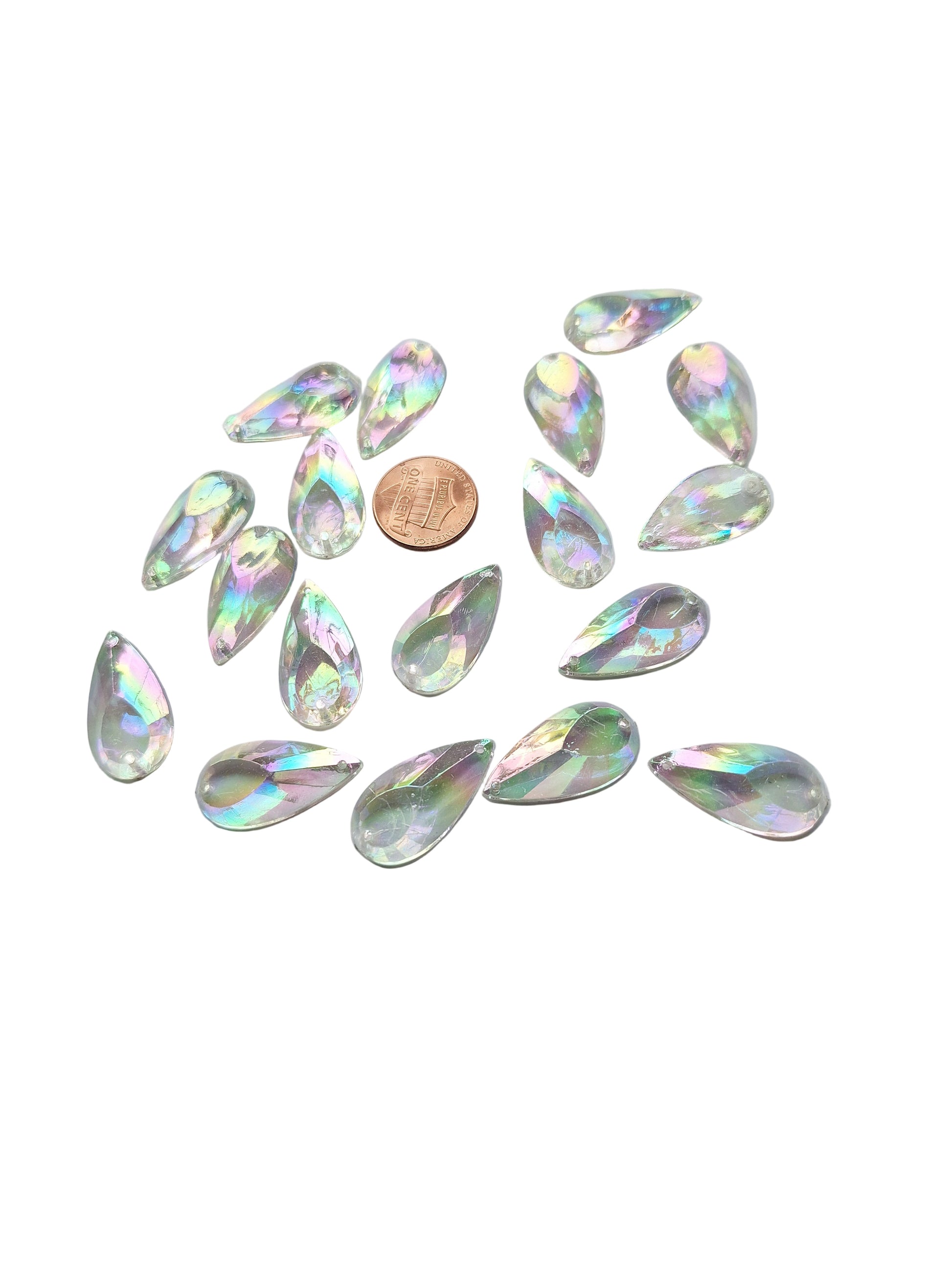 Group photo of vintage crystal AB acrylic teardrop cabochon, table-cut with two-hole sew-on flat back, 14×27 mm. Penny is shown for scale